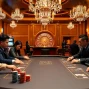 Compelling casino action showcasing players at a poker table, embodying nhà cái lc88's vibrant gaming experience.