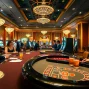 Exciting casino environment showcasing RR88 with players engaged at blackjack tables.